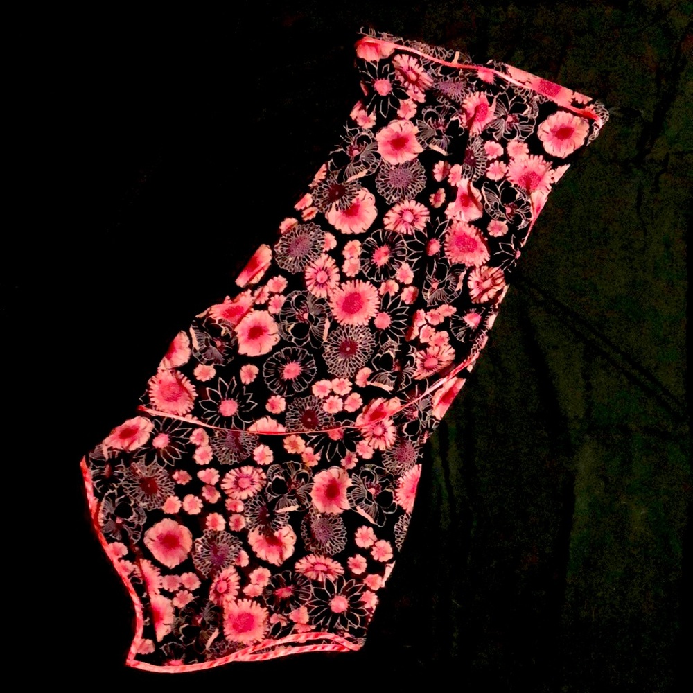 Small strapless asymmetrical flower print dress.